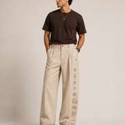 MELŪ Pleated Trousers — Ivory Cream